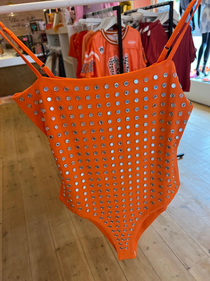 Orange body studs